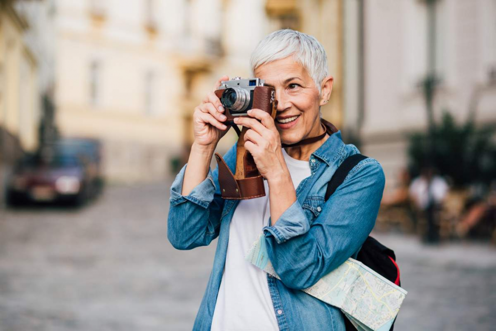 a lady photographer holding a camera