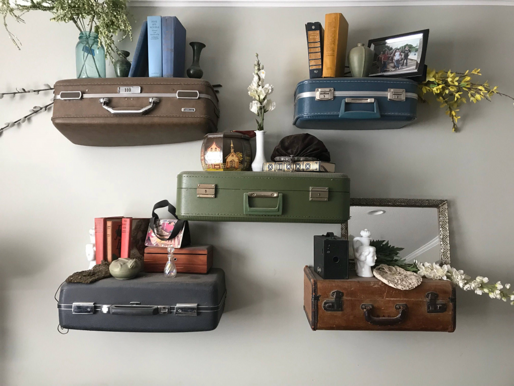 image of DIY Eco-Friendly Home Decor with suitcases on the wall